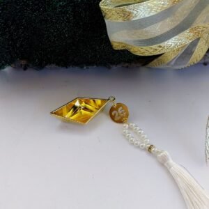 Alternative view of Γούρι καραβάκι μεταλικό με φούντα και πέρλες